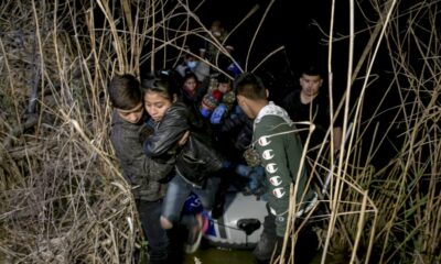 migrants,-policiers,-passeurs,-defile-nocturne-sur-les-bords-du-rio-grande