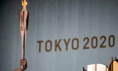 jo-2020:-la-flamme-olympique-arrive-a-tokyo-dans-une-ambiance-morose