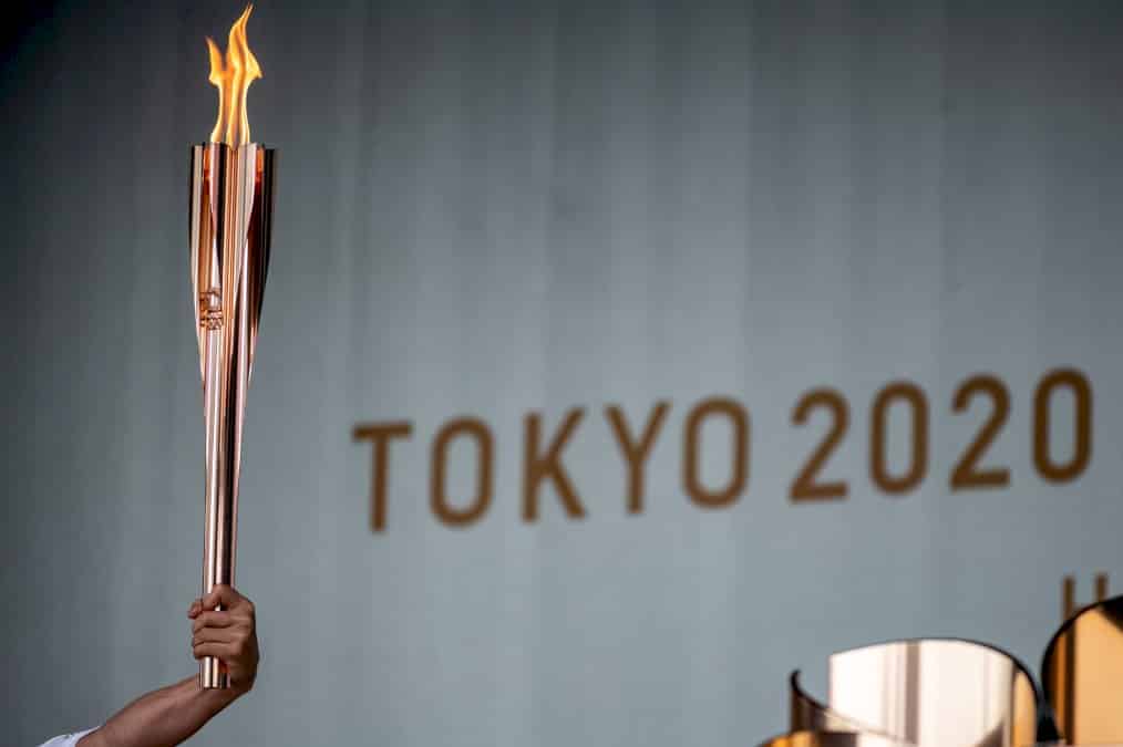 jo-2020:-la-flamme-olympique-arrive-a-tokyo-dans-une-ambiance-morose