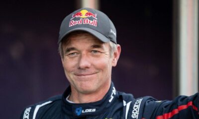 Sébastien Loeb au départ d'un rallye régional avec sa compagne
