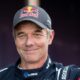 Sébastien Loeb au départ d'un rallye régional avec sa compagne