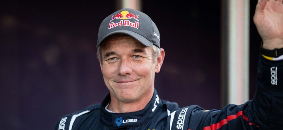 Sébastien Loeb au départ d'un rallye régional avec sa compagne