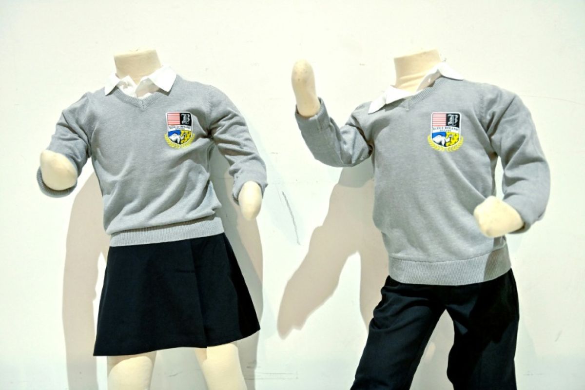 Uniformes à l’école, des villes disent oui malgré un financement qui s’évapore
