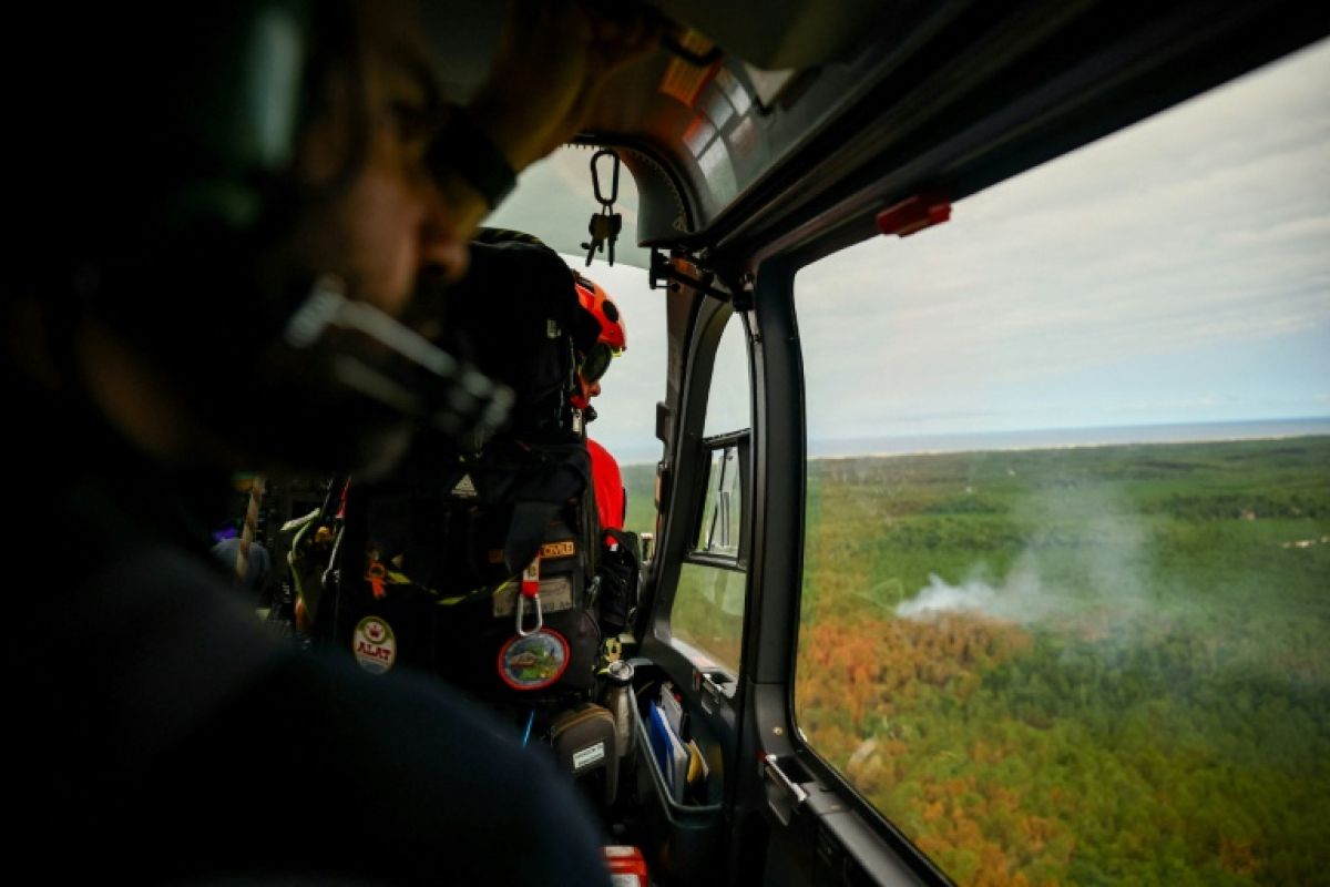 Depuis le ciel, les pilotes du feu racontent une bataille inégale
