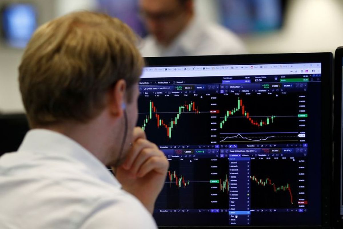 Les Bourses se reprennent grâce au pétrole et à la tech avant un mercredi décisif