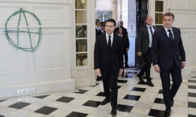 Macron promet des défilés à l'écart des centres-villes