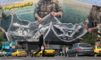 Sur les murs de Téhéran, la guerre s'affiche en grand